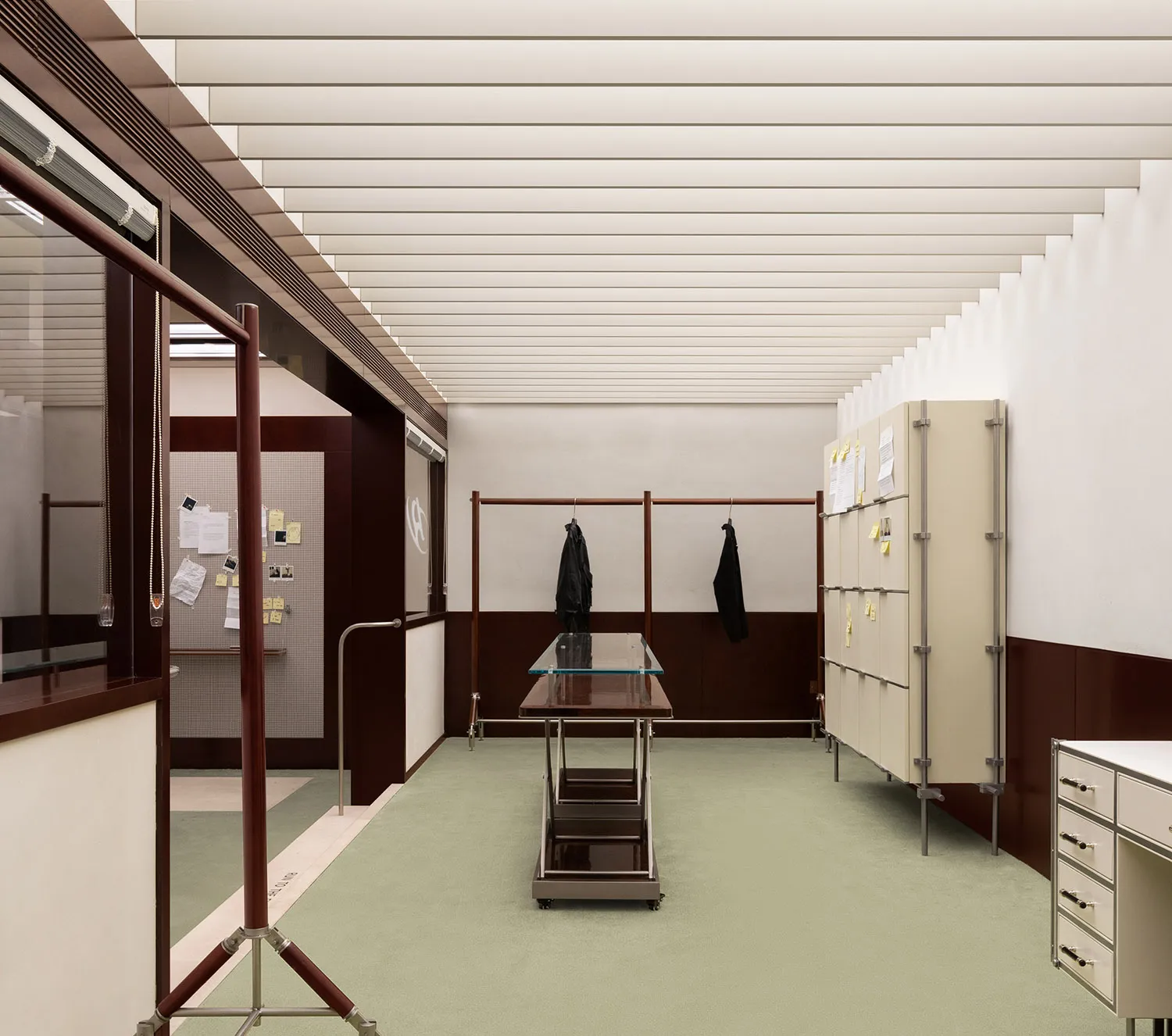 Modern office space with glass, metal, and wooden elements