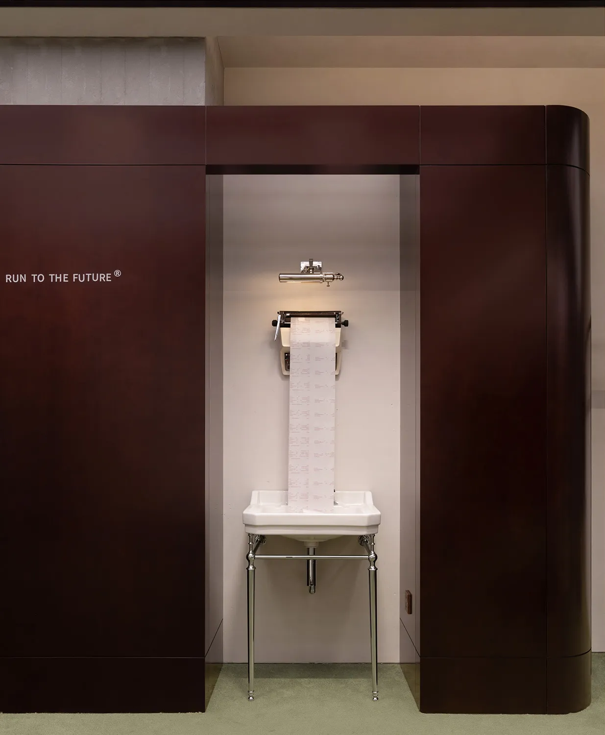 A bathroom with ceramic fixtures, metallic accents, and plastic elements.
