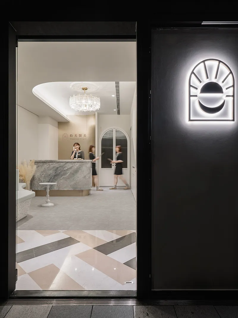 A modern reception desk with a marble finish.