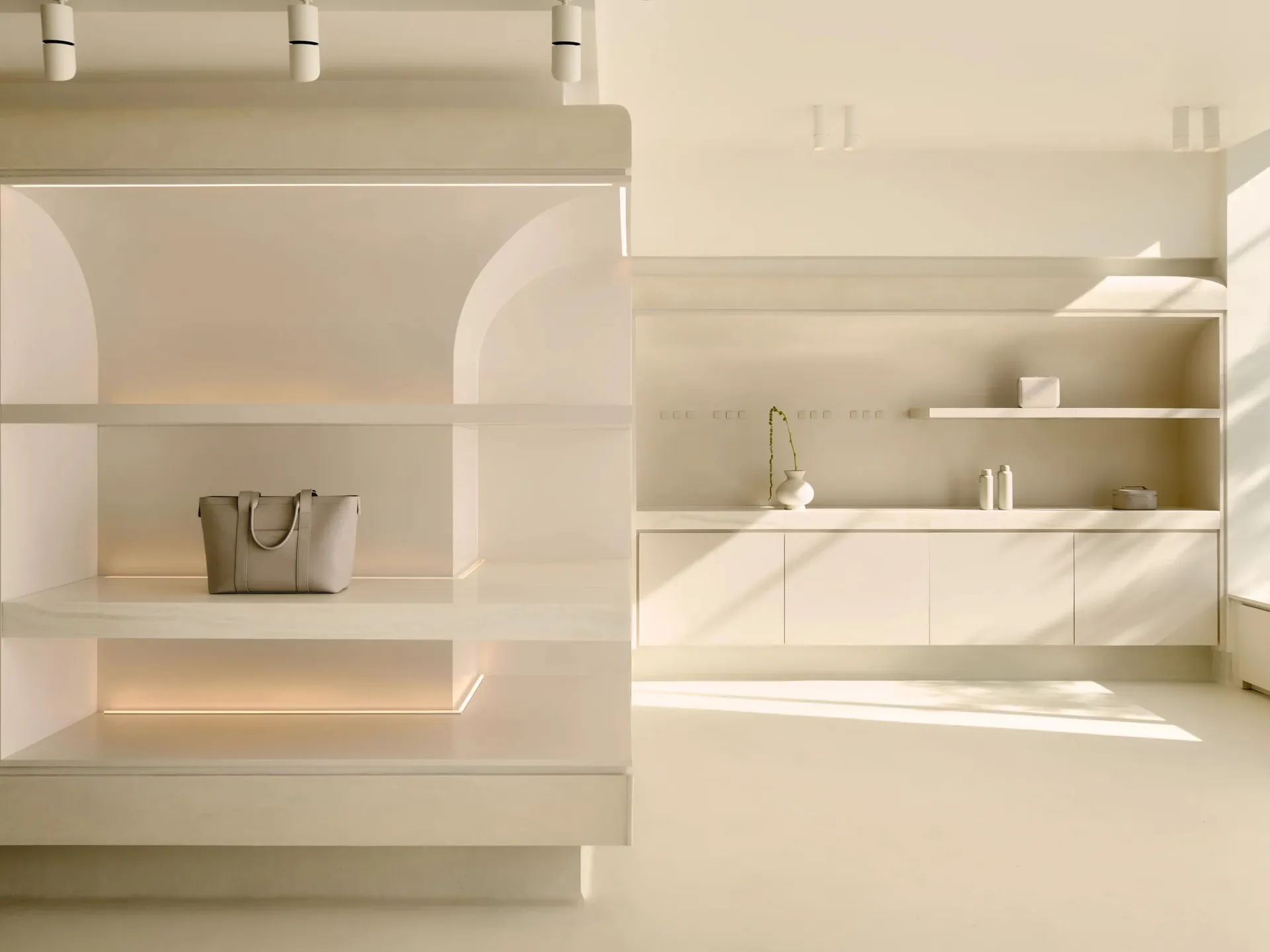 Modern retail store with stone display and minimalist design elements.