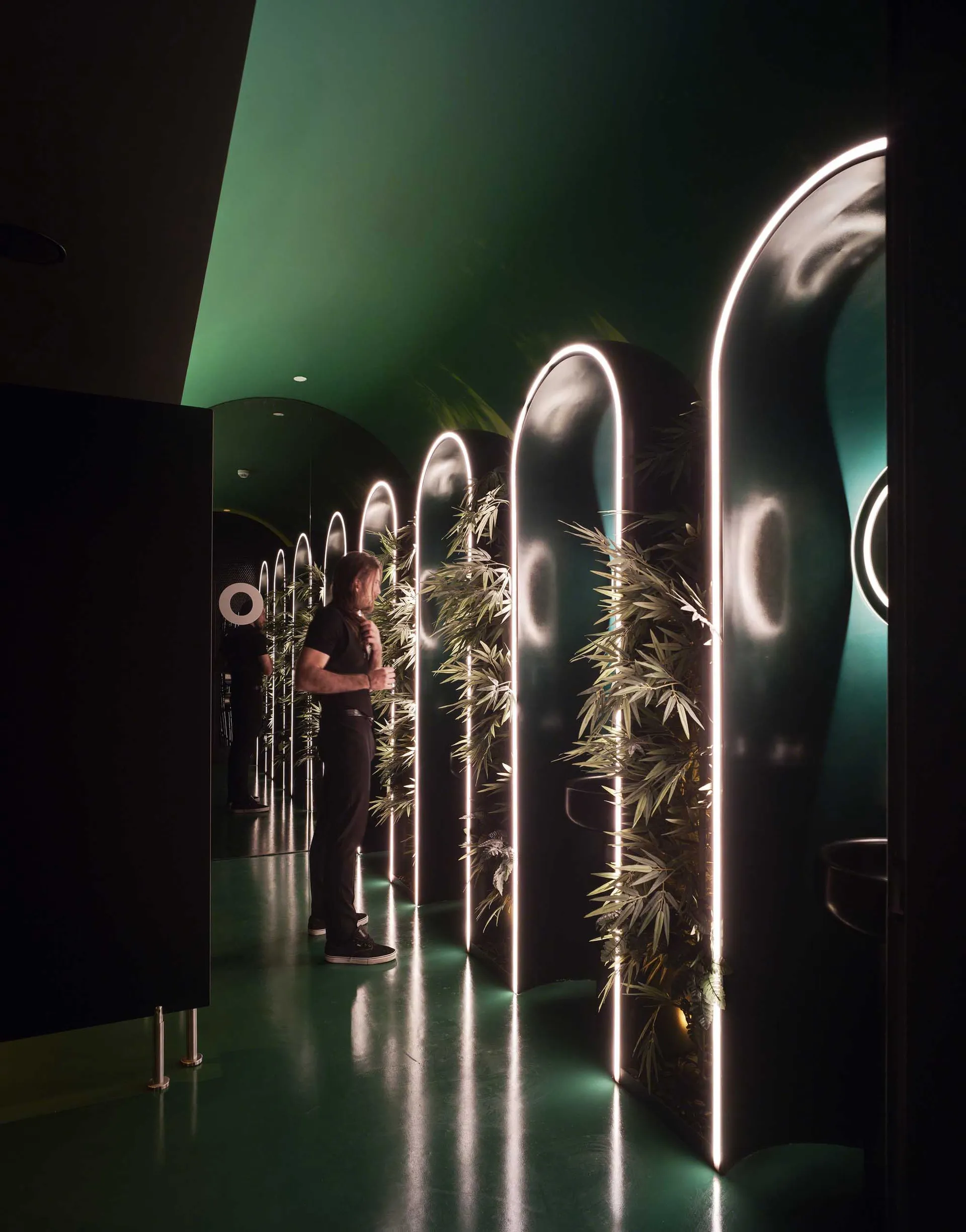 Industrial-style interior space with illuminated lighting features.