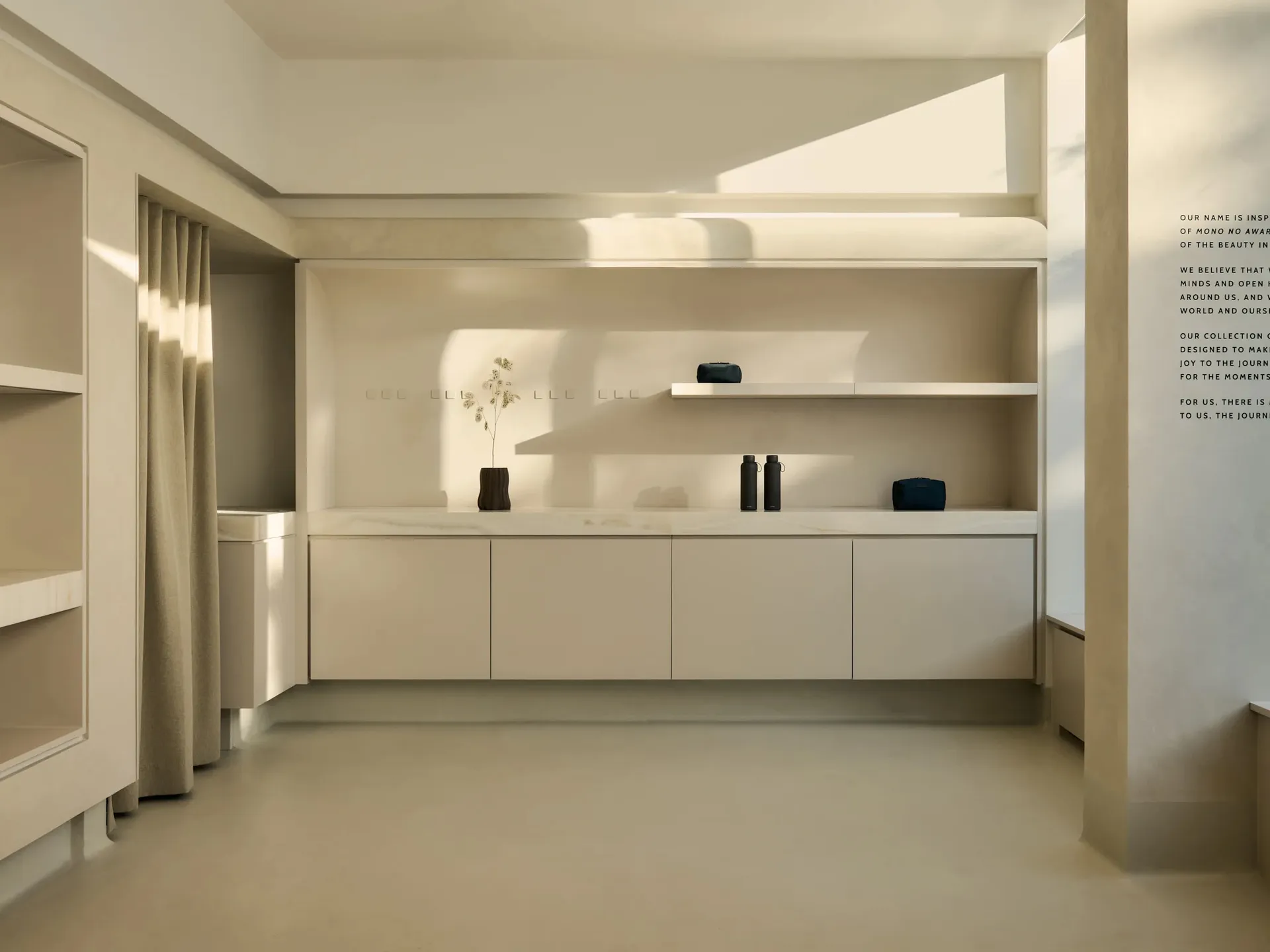 A minimalist interior space featuring a display case made of concrete.