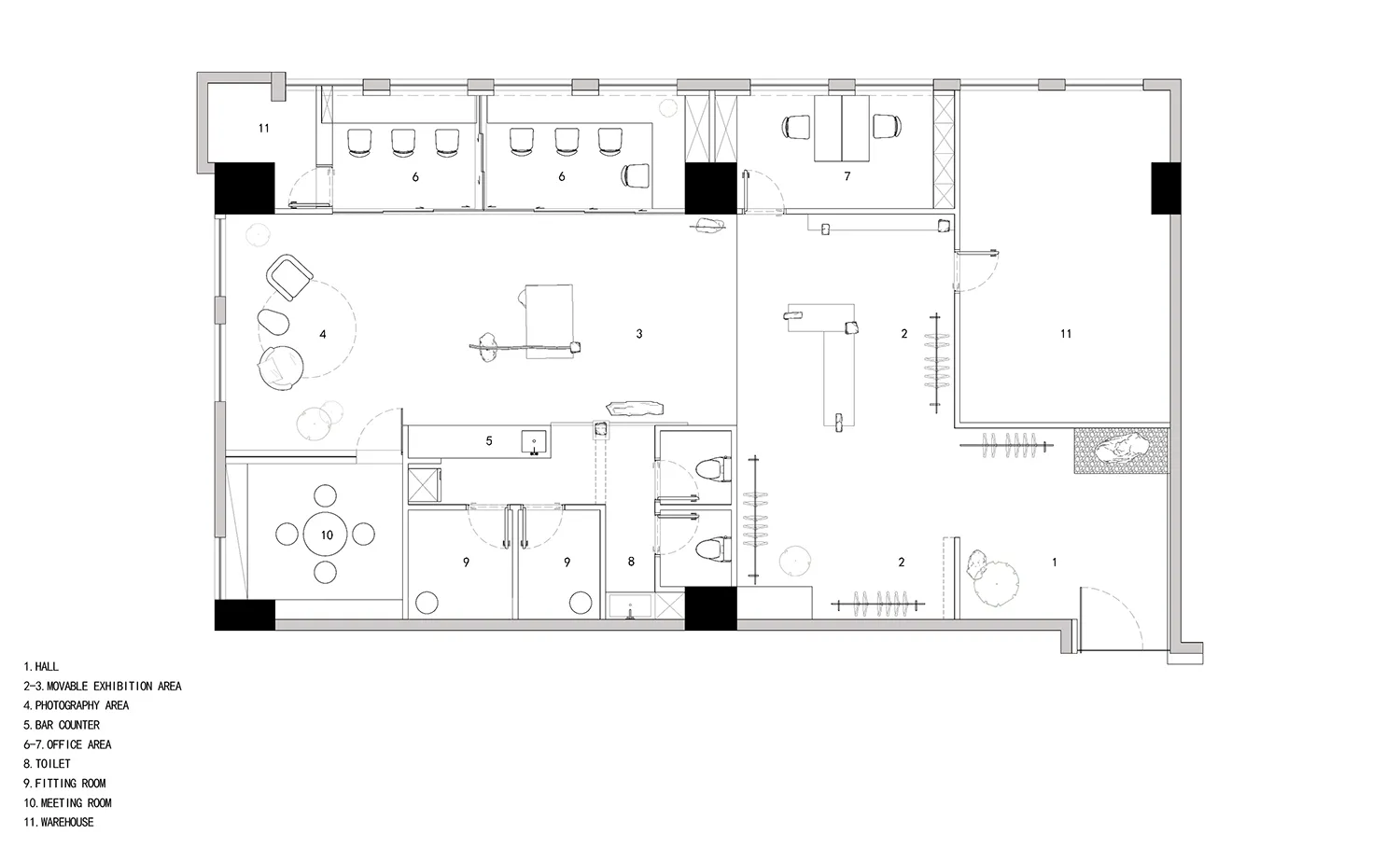 A detailed architectural floor plan of an office building on paper.