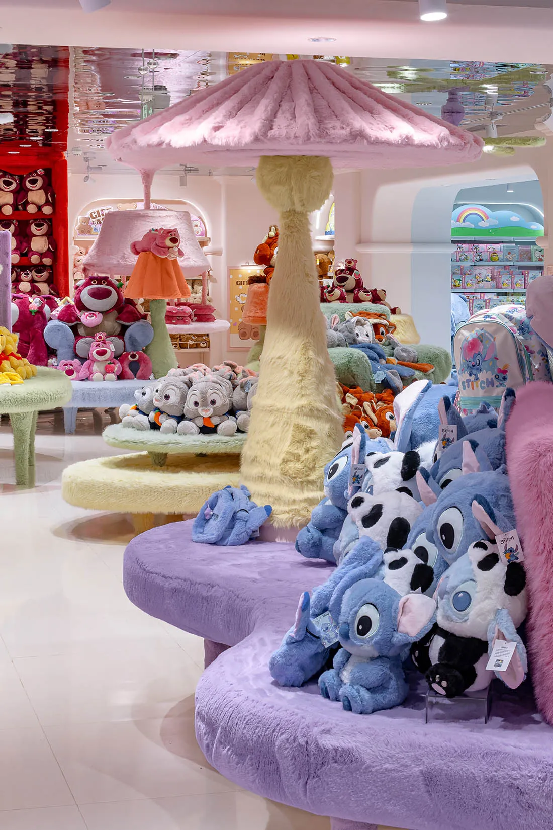 A brightly colored toy shop displaying various plush toys.