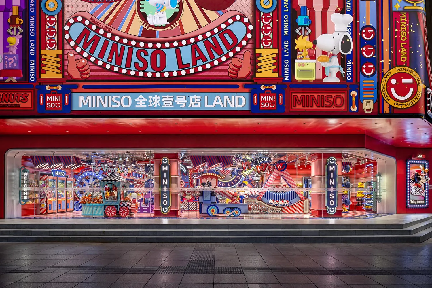 A vibrant and colorful storefront with glass display cases showcasing a variety of products.