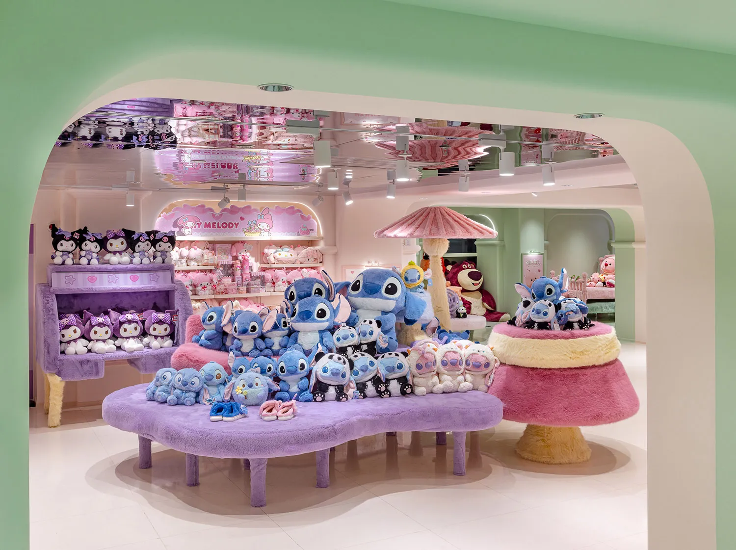 A toy shop filled with various plush toys and stuffed animals displayed on tables and shelves.
