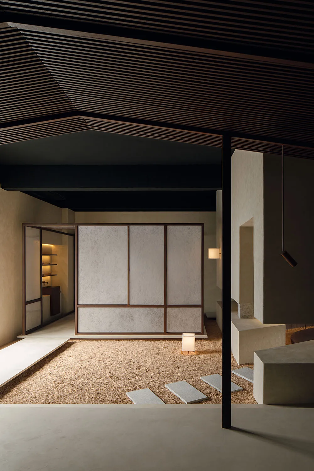 Modern living room with concrete flooring and minimalist design