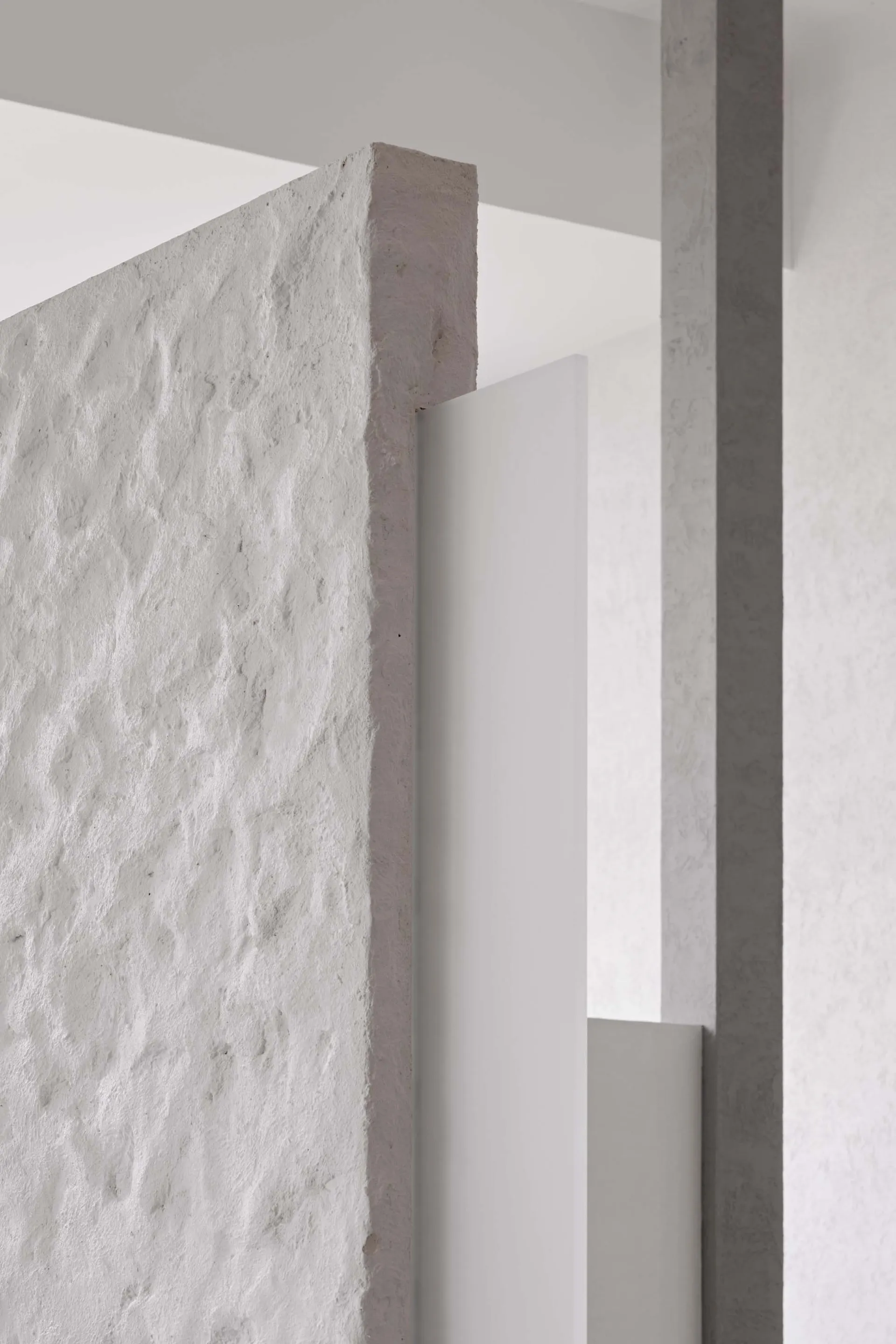 Minimalist interior design with concrete architectural elements
