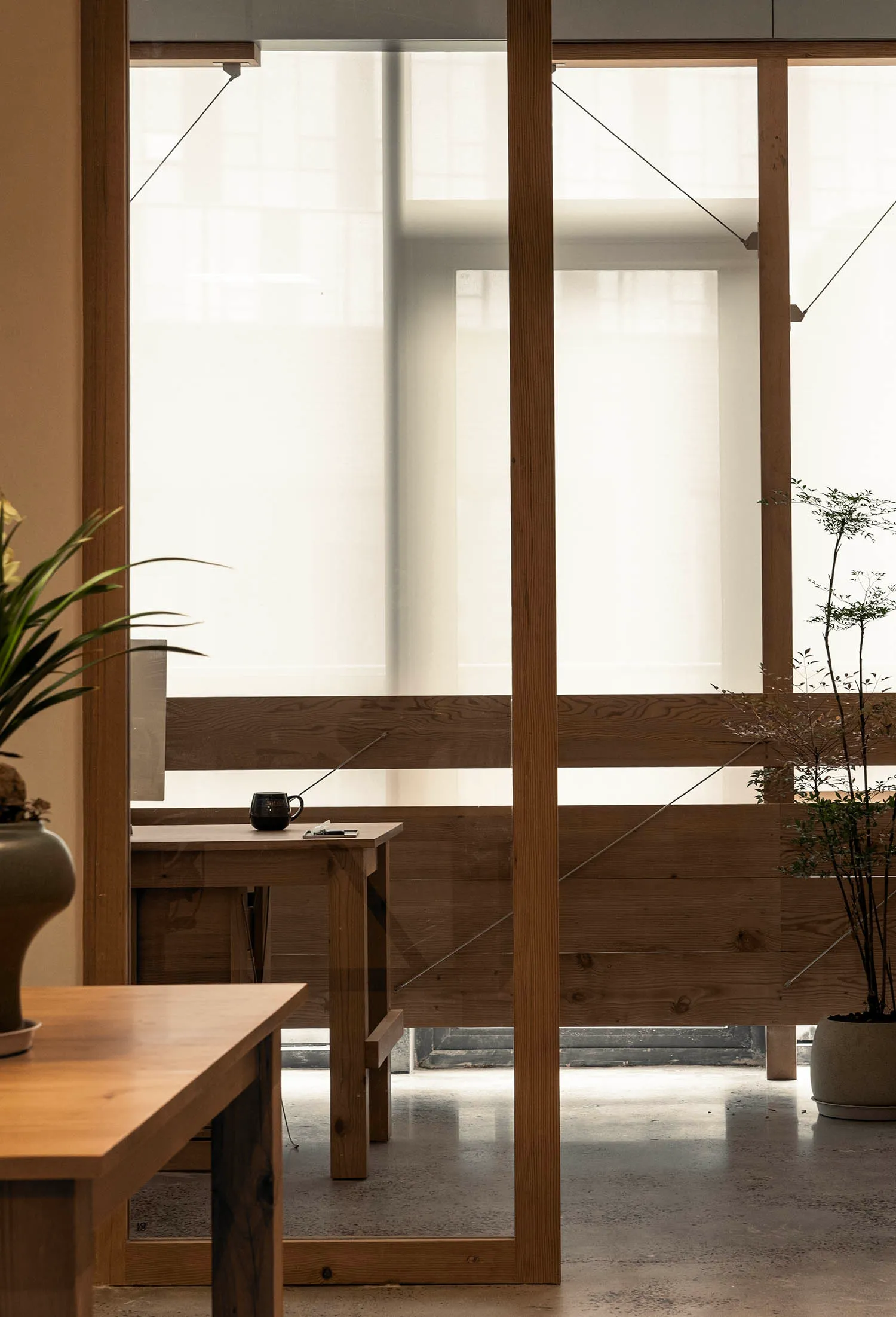 Minimalist interior design featuring wood elements.