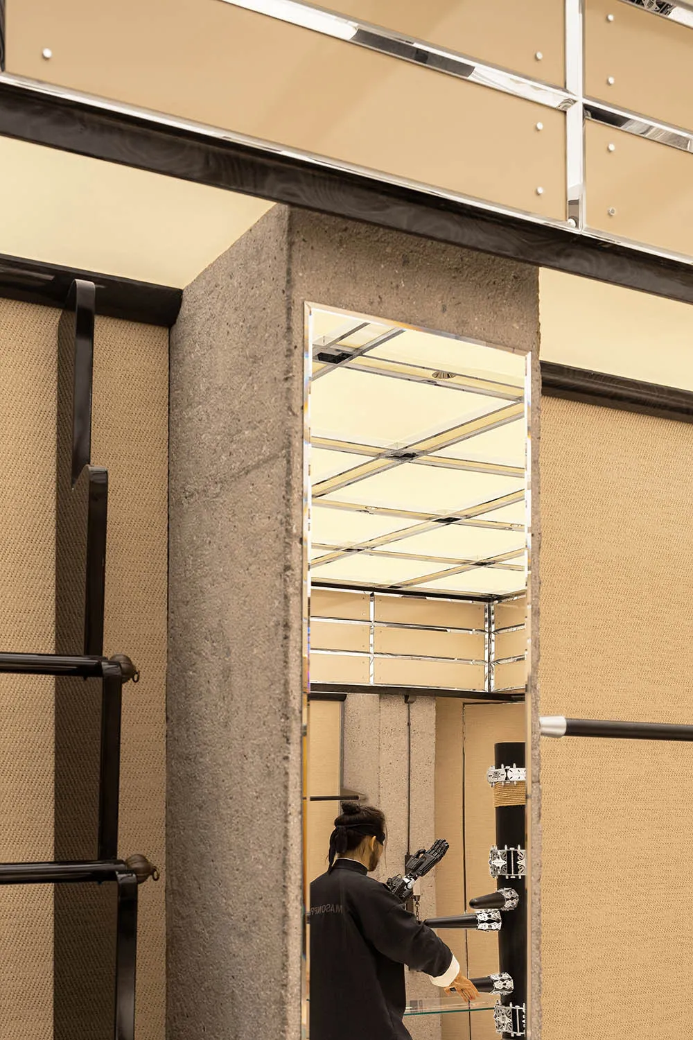 A minimalist storefront with concrete finishes and modern design elements.
