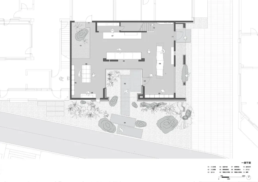 A detailed architectural floor plan featuring a modern industrial office space with concrete floors, brick walls, and large g
