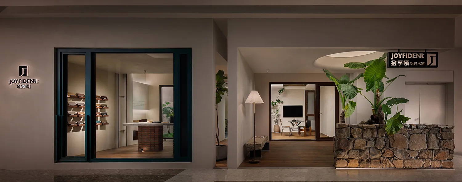Modern showroom with metal frame and green plant decorations
