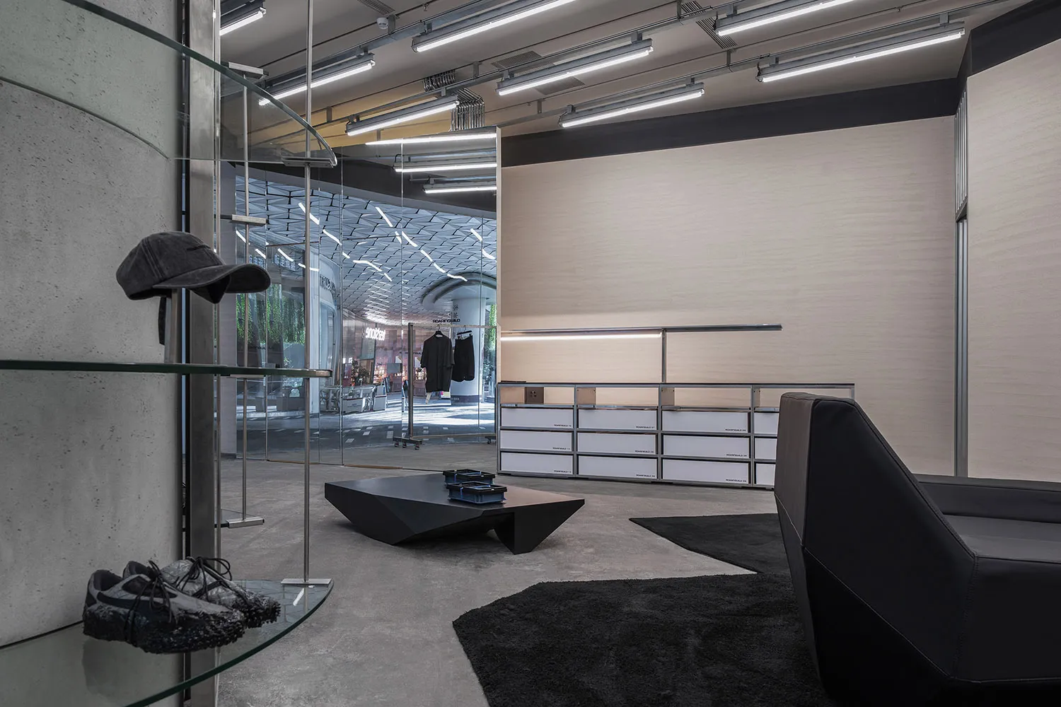 Concrete storefront with minimalist design and glass display case