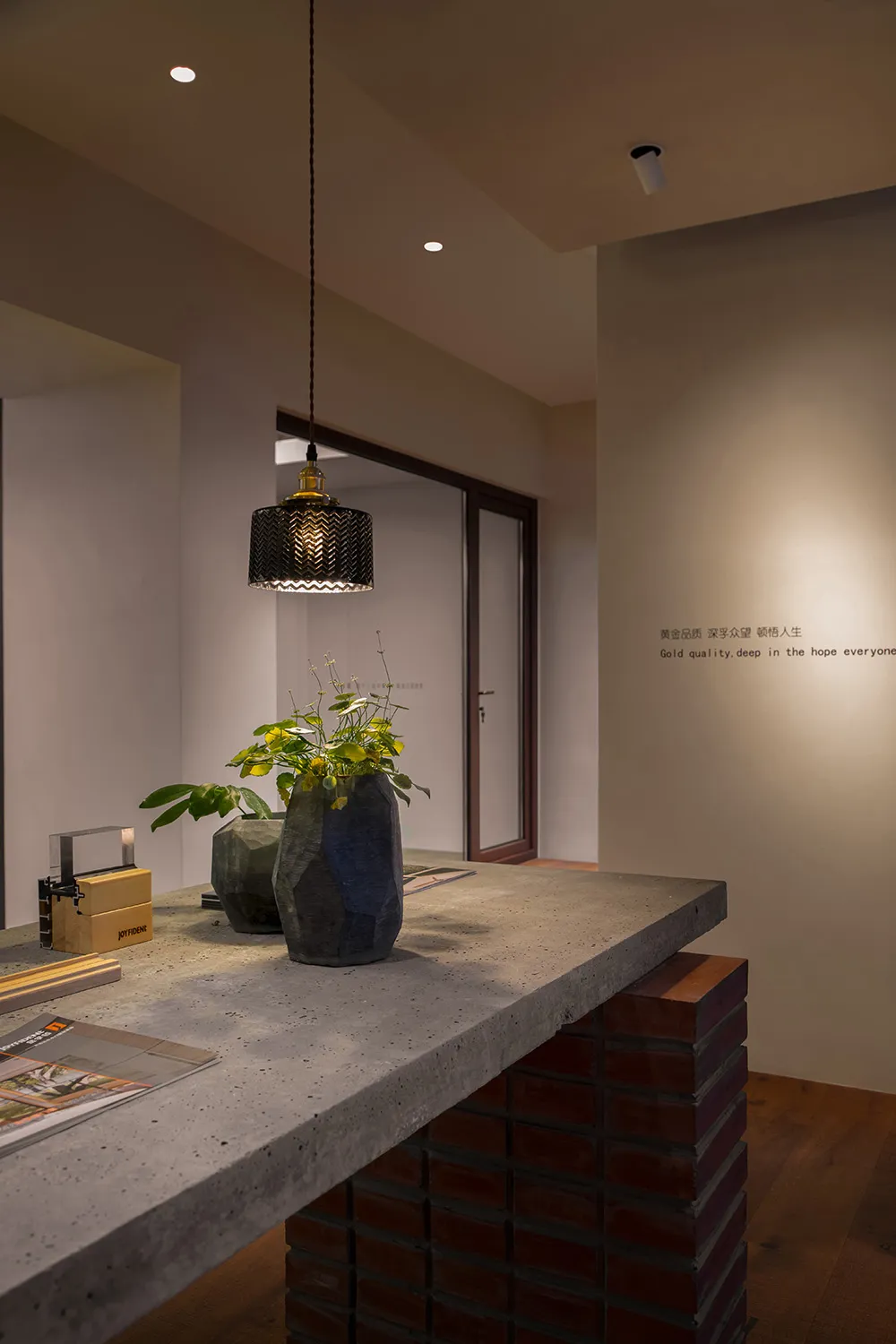 Modern retail storefront featuring concrete and brick materials