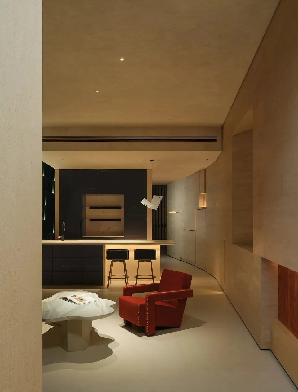 Minimalist living room with marble floor and concrete walls