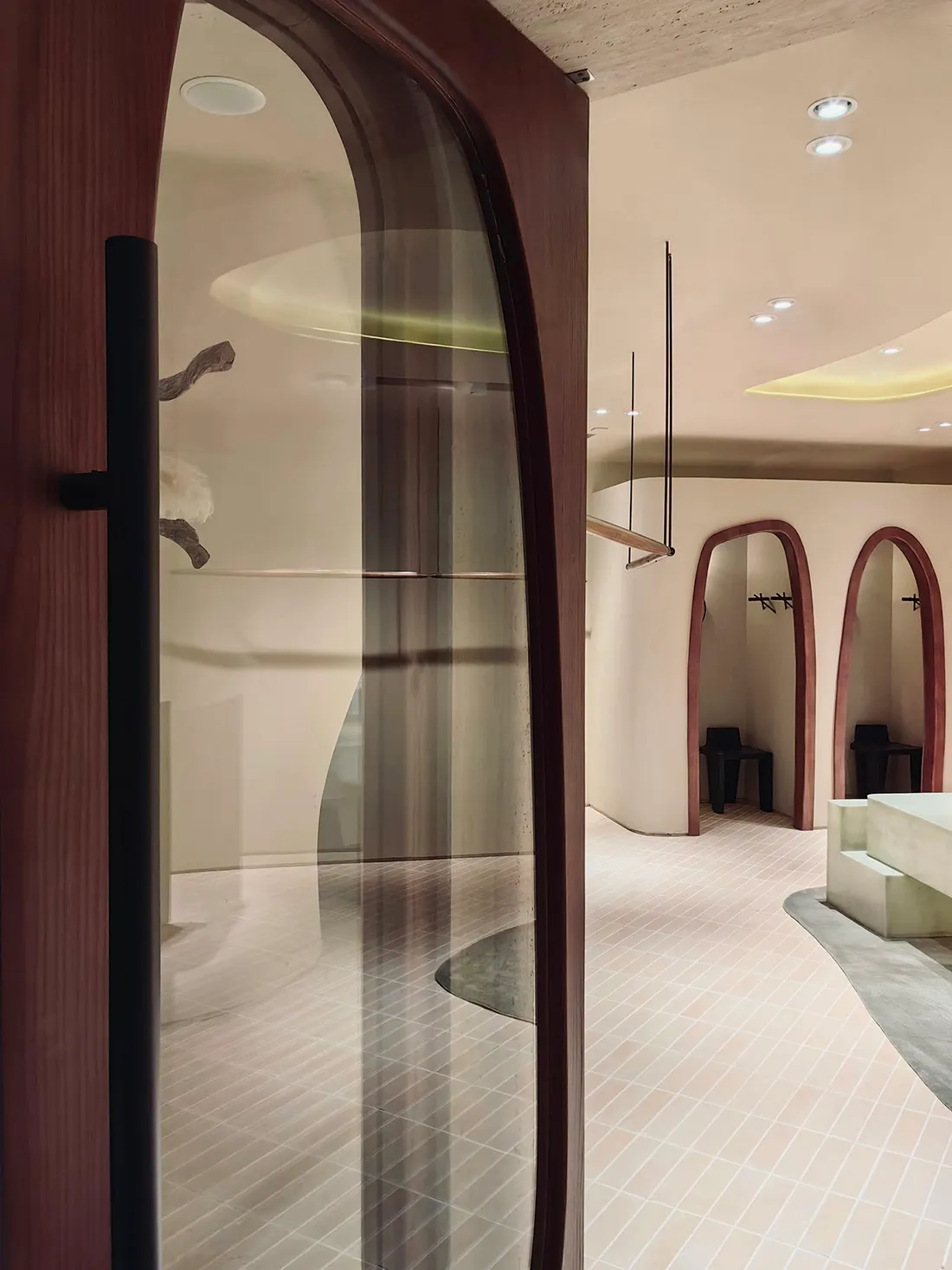 A minimalist retail storefront with wooden elements and an open, inviting design.