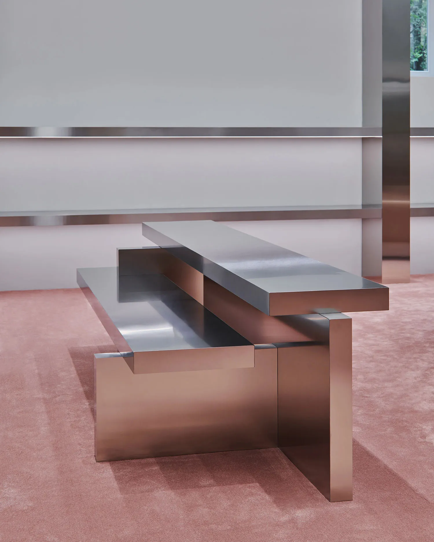 Modern metal bench with two shelves in minimalist interior design setting