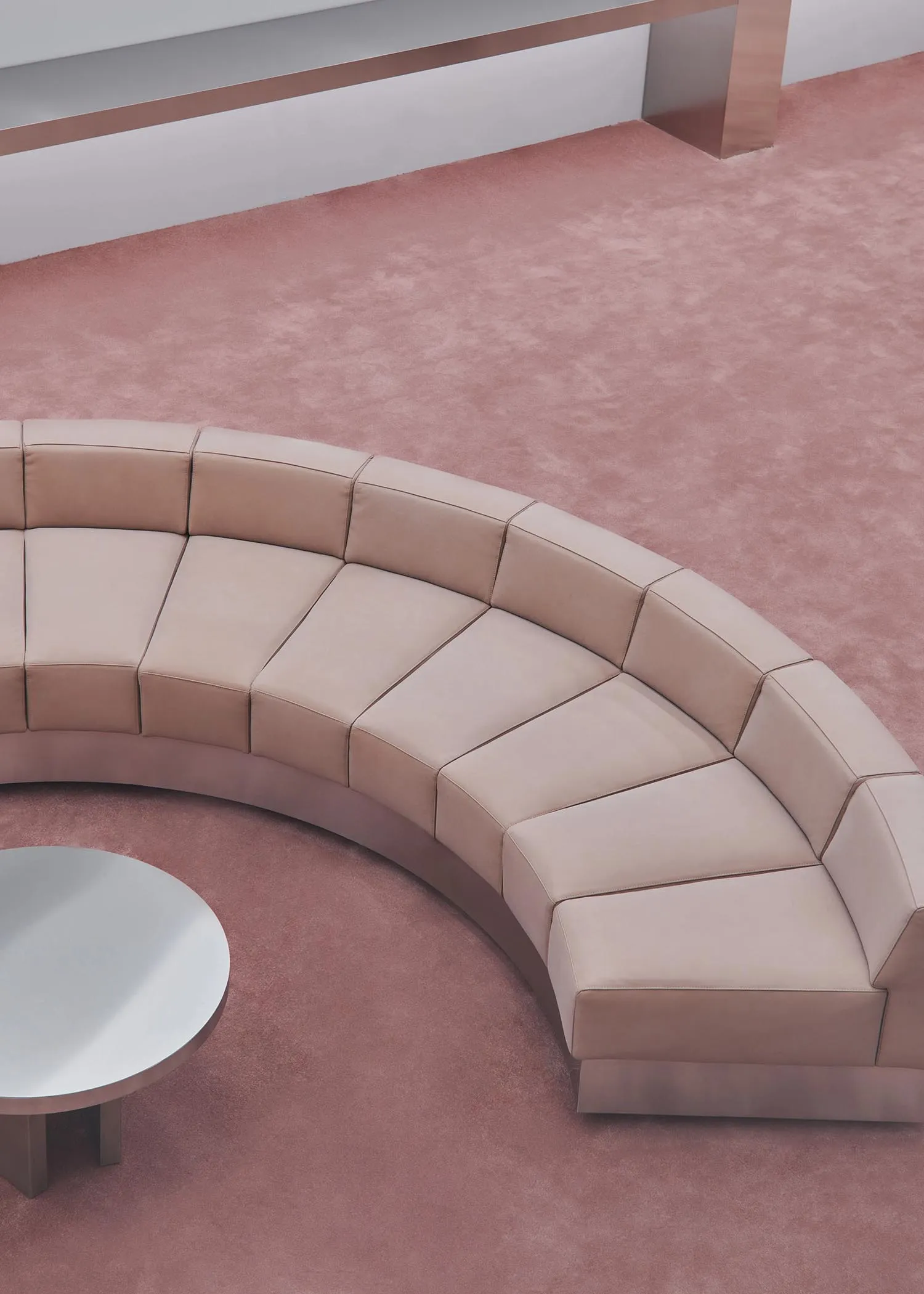 Modern circle-shaped leather sofa set with geometric design.