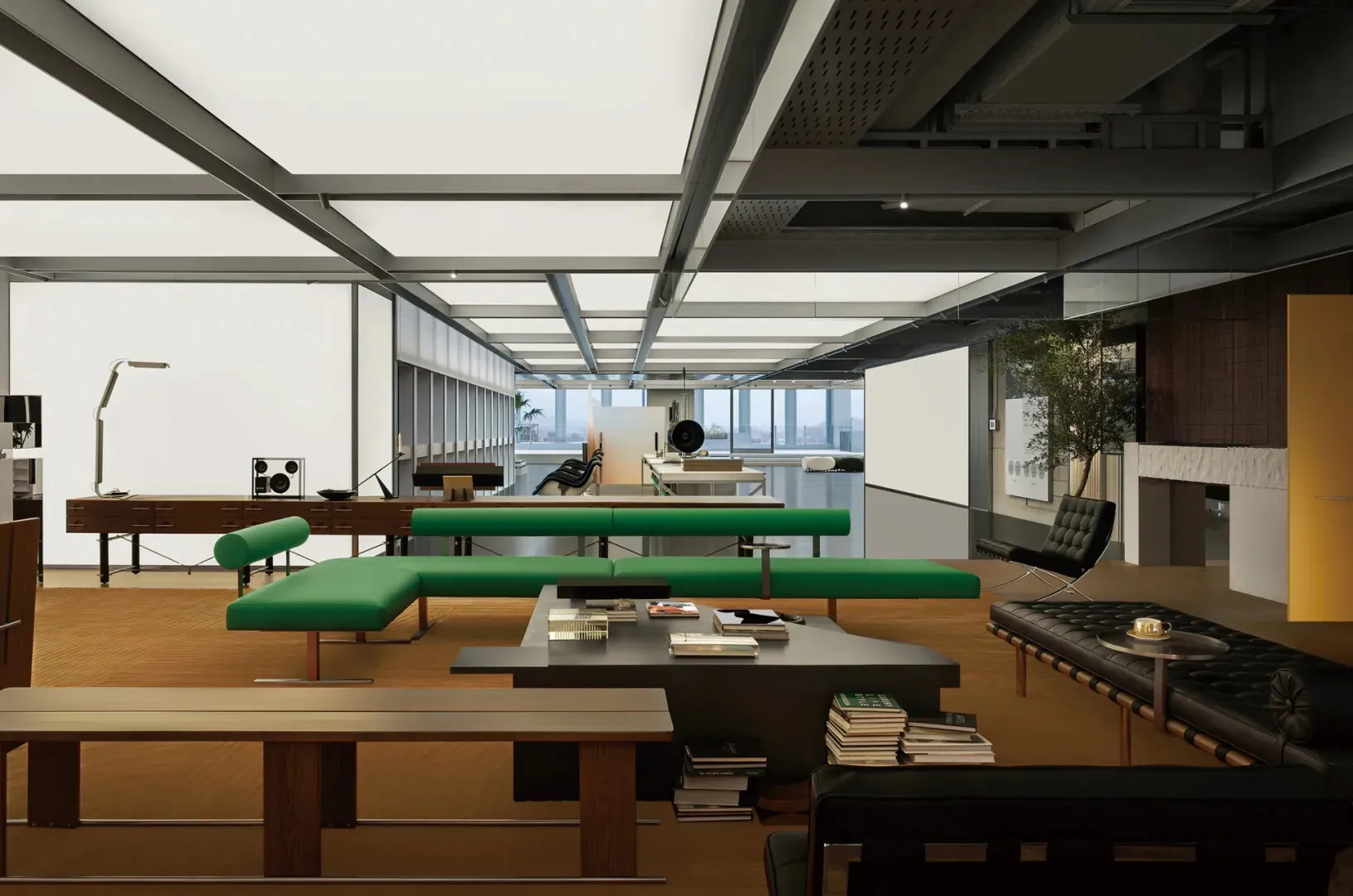 Industrial-style office space with concrete floors, wooden tables, and glass partitions.