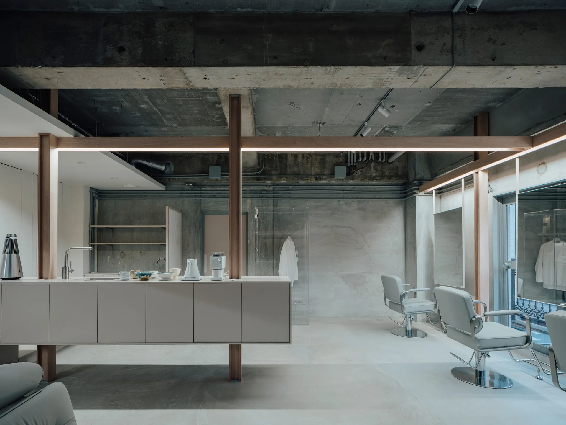 Modern living room with minimalist furniture and concrete walls