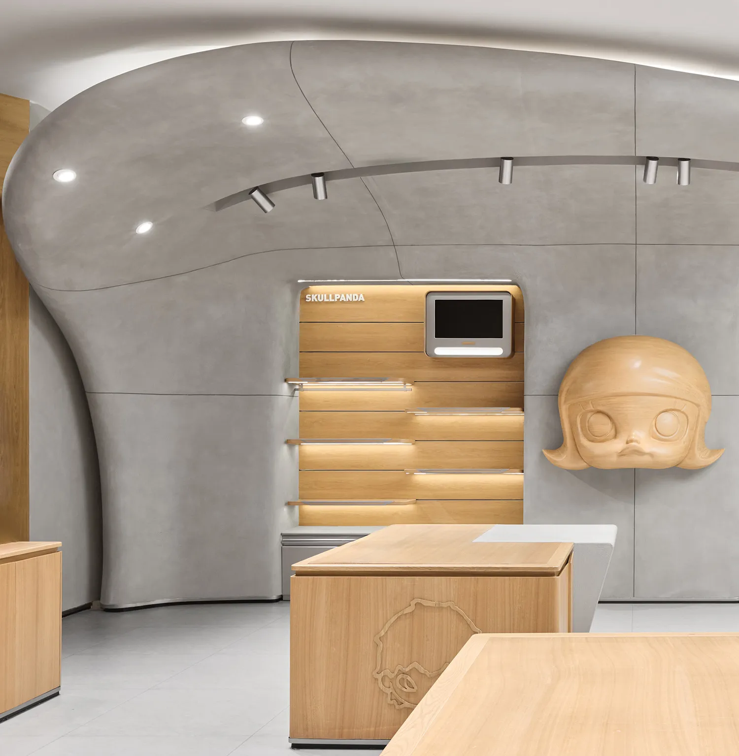 A modern storefront display featuring wood and concrete materials.
