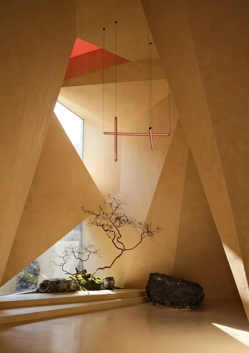 Modern interior with minimalist design, featuring a concrete floor, geometric wall panels, and natural light from large windo