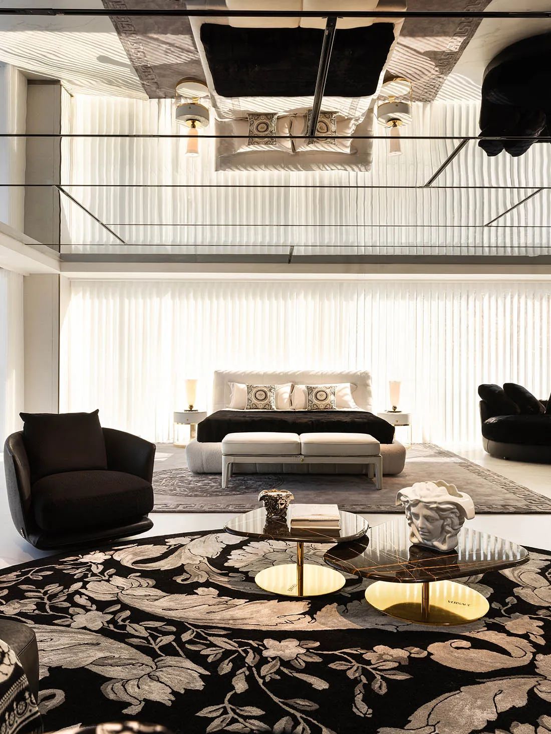 Modern living room featuring textured sculptures and leather upholstery