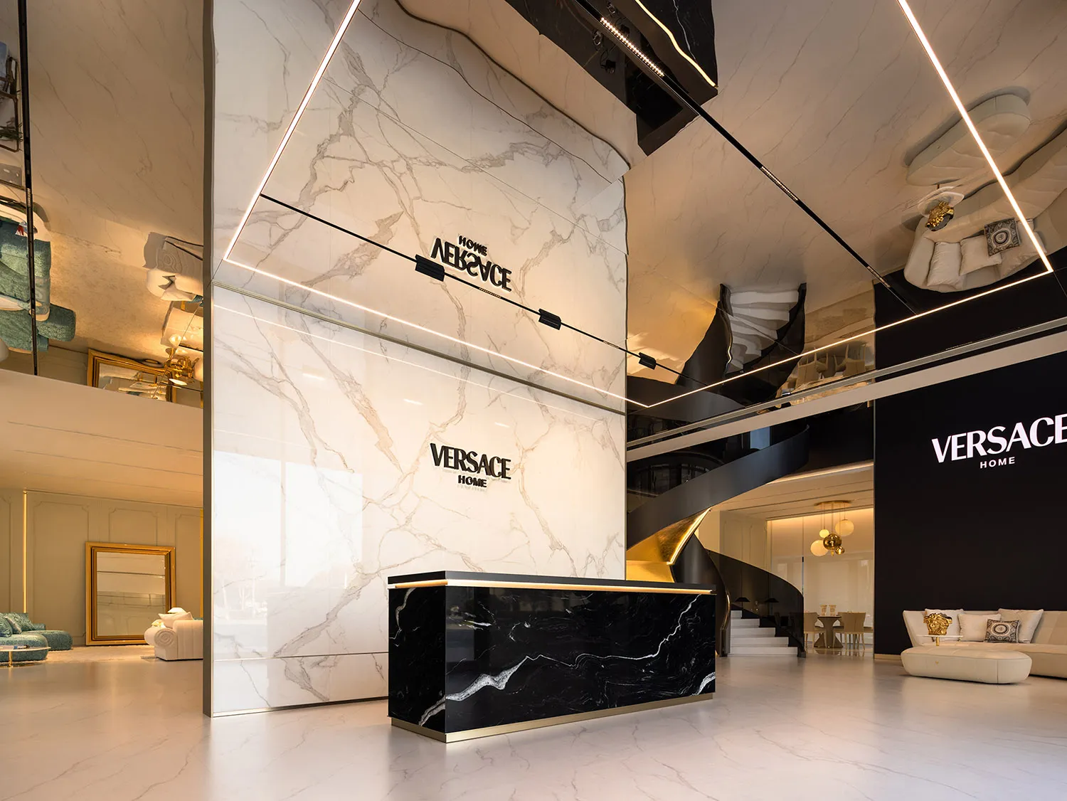 Modern Versace Home Office featuring marble walls and black marble desk