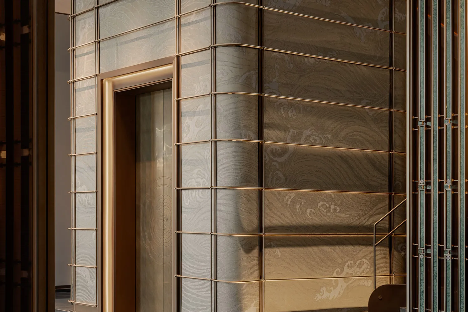 Modern commercial space featuring glass paneling and brass accents.