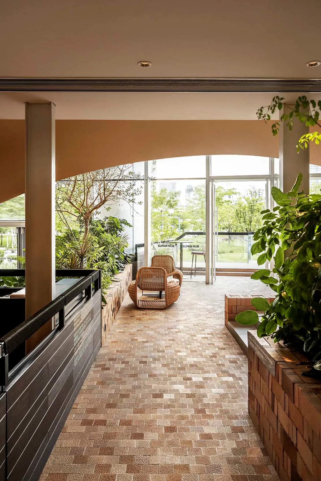 Modern interior space with timber, concrete, and brick materials