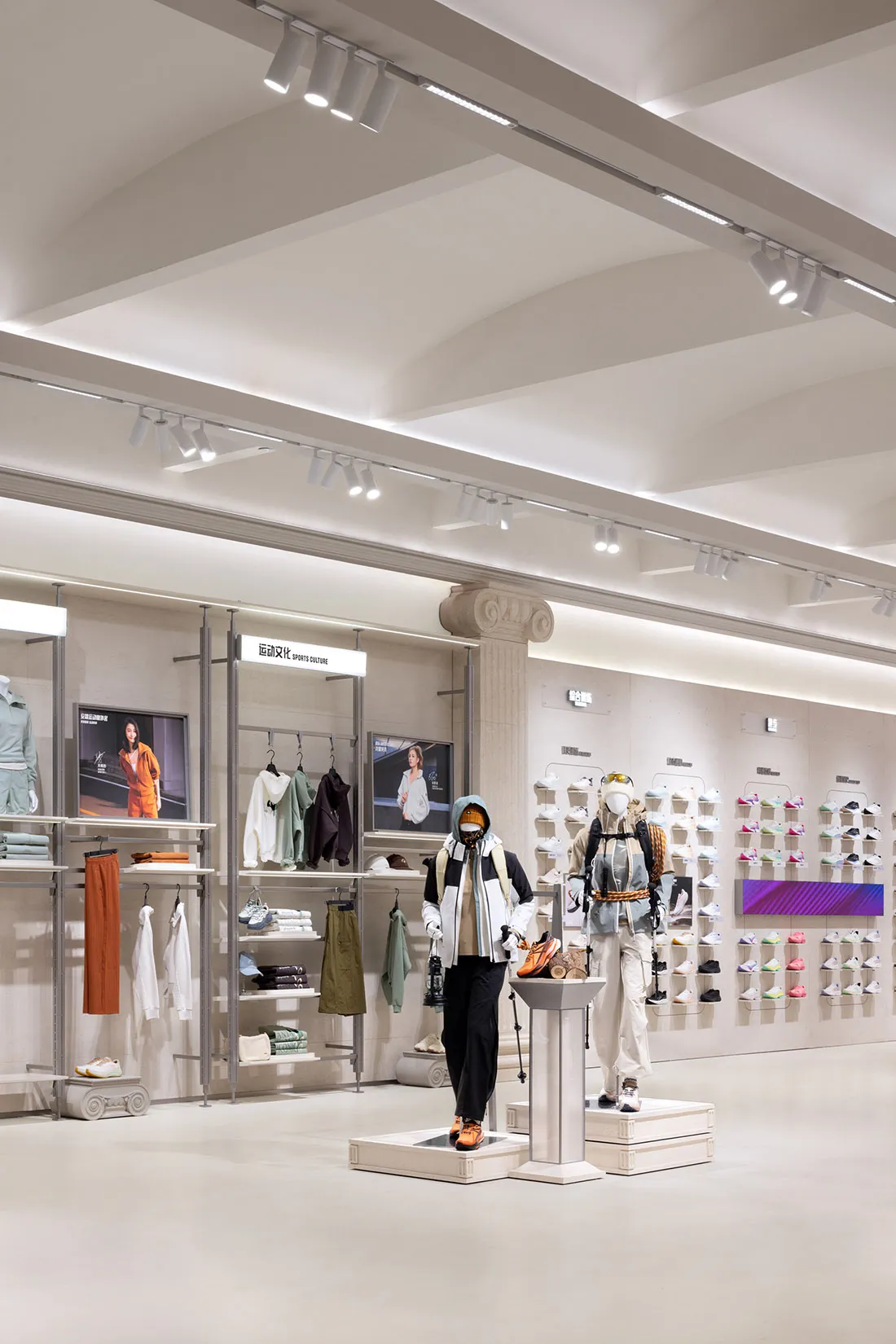 A retail store interior featuring modern design elements with concrete as the primary material.