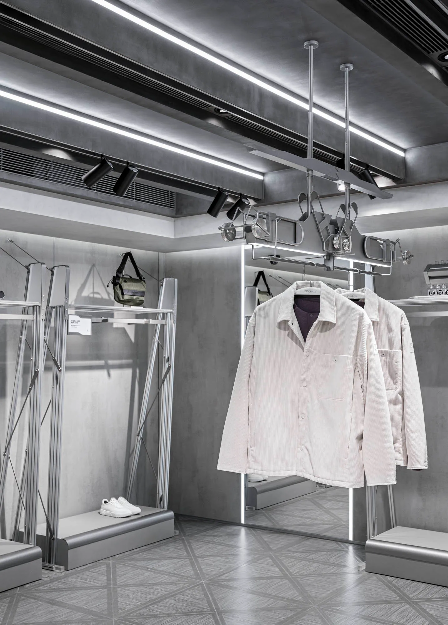 Modern retail storefront featuring minimalist design and metal finishes