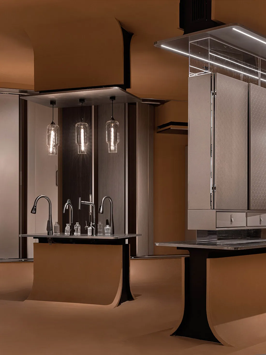 Modern industrial kitchen featuring metal and glass materials and sleek design elements.
