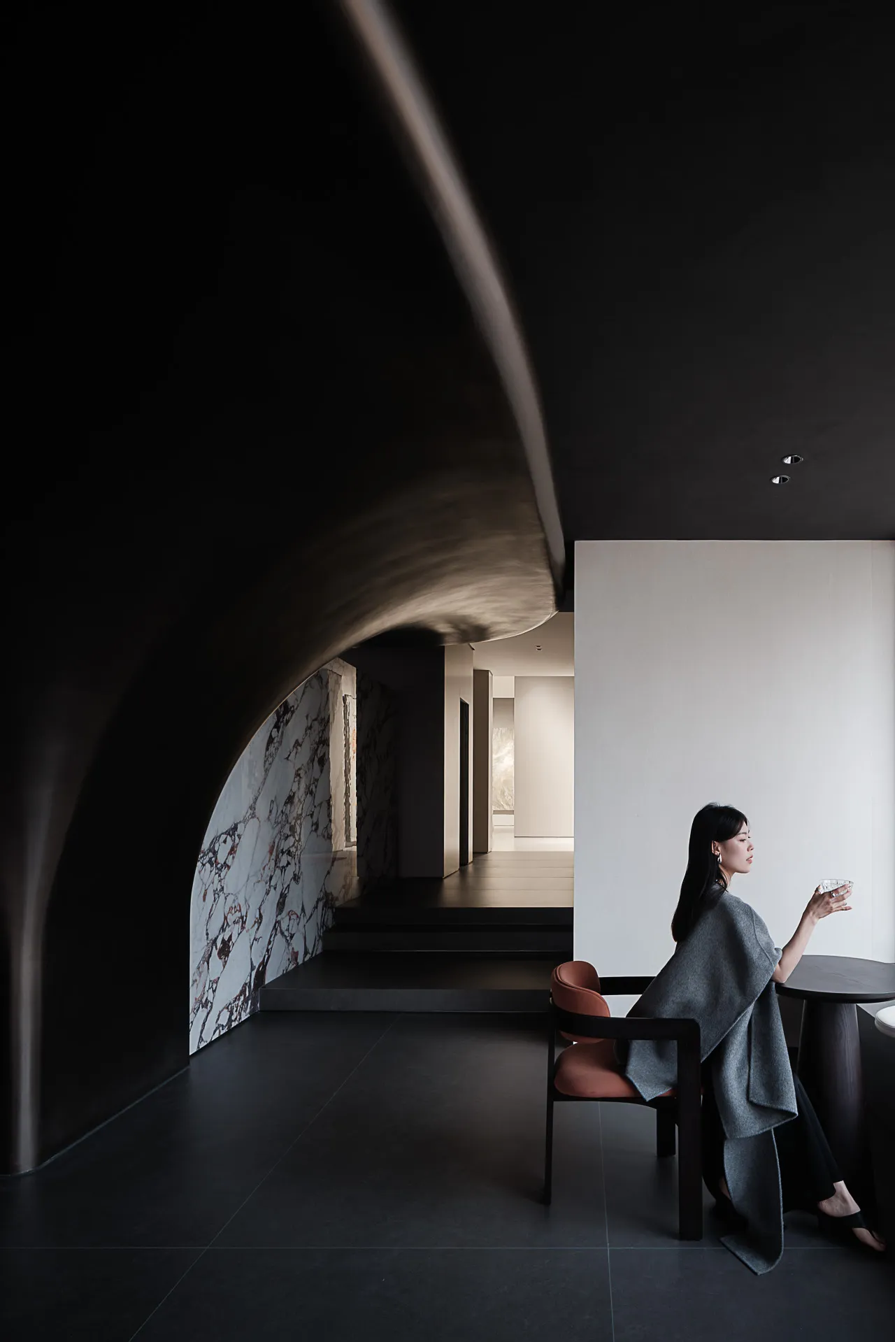 A modern interior design featuring black and white color scheme