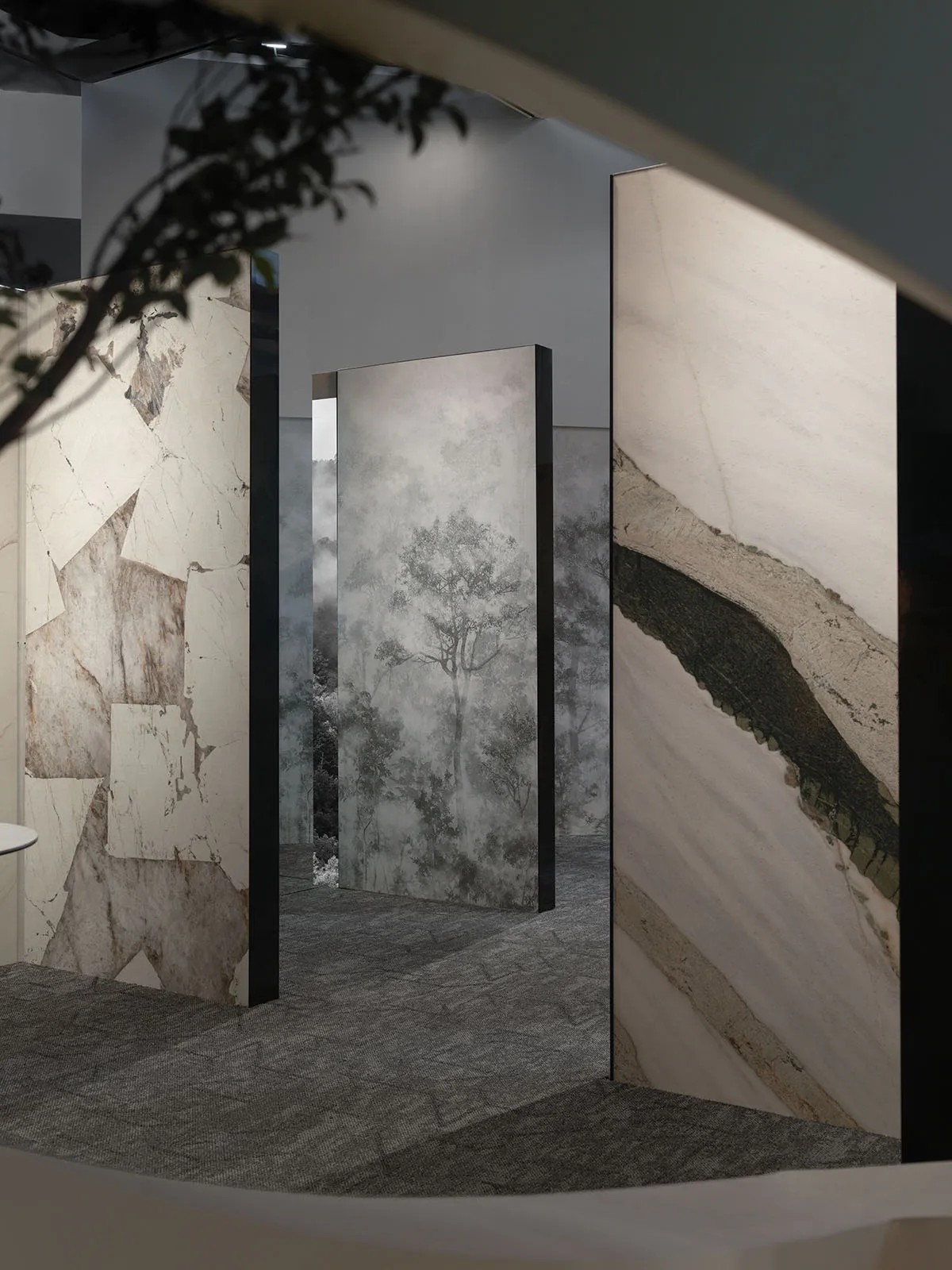 Modern interior design featuring marble walls and flooring, with a minimalist and elegant aesthetic.