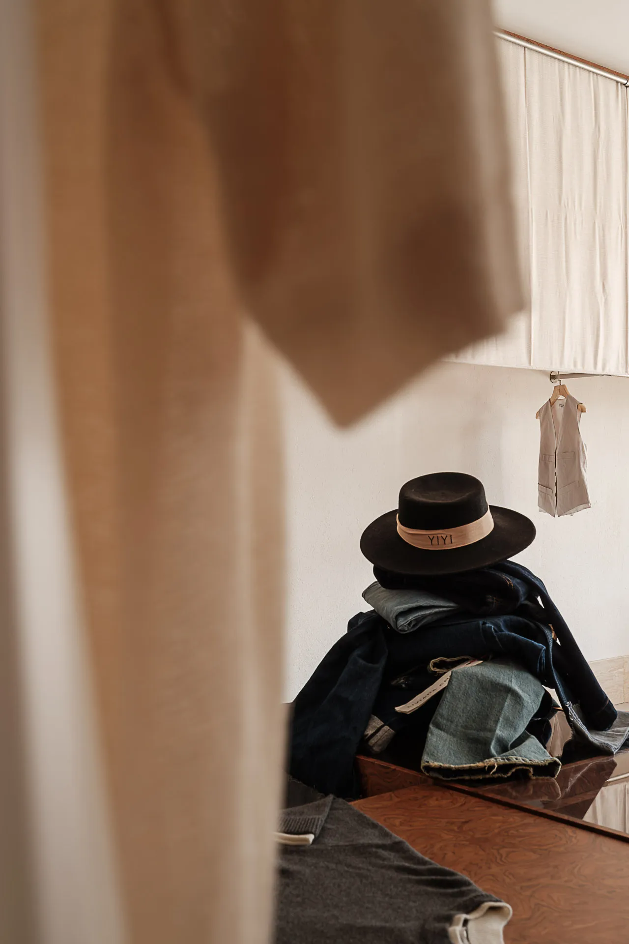 A neatly arranged closet filled with various types of clothing.