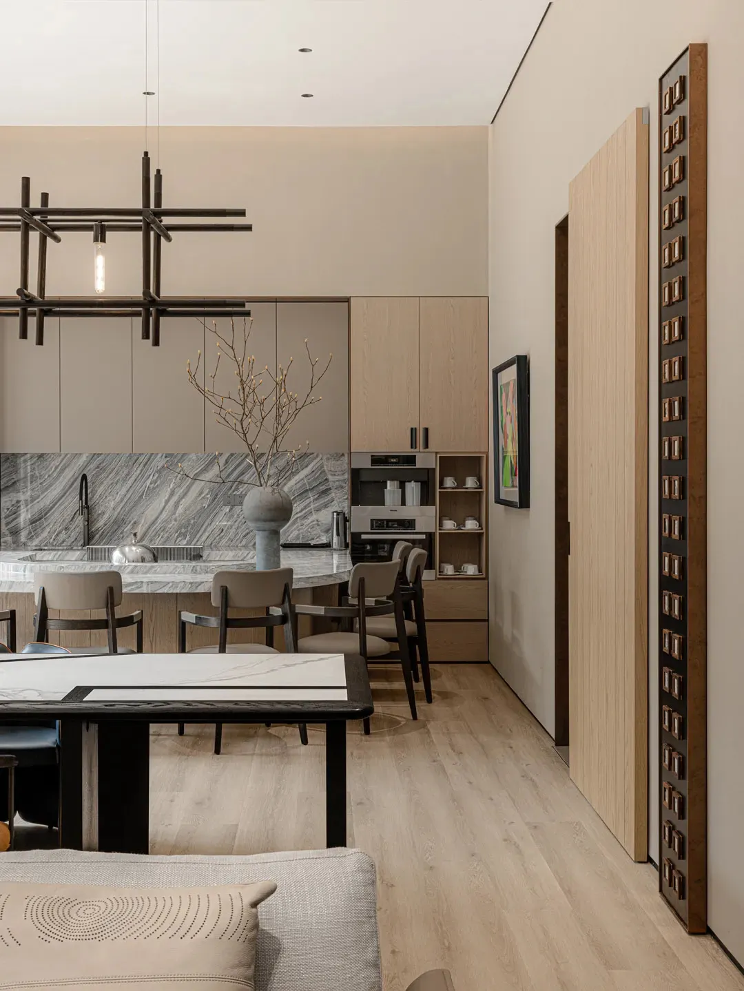Modern kitchen featuring a marble countertop with a minimalist design aesthetic.