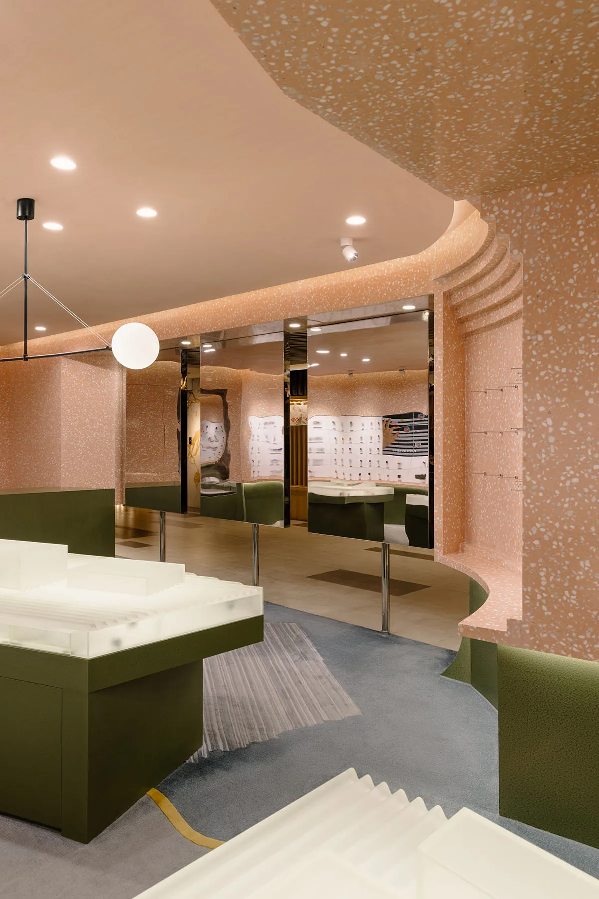 Modern retail space featuring a terrazzo ceiling.