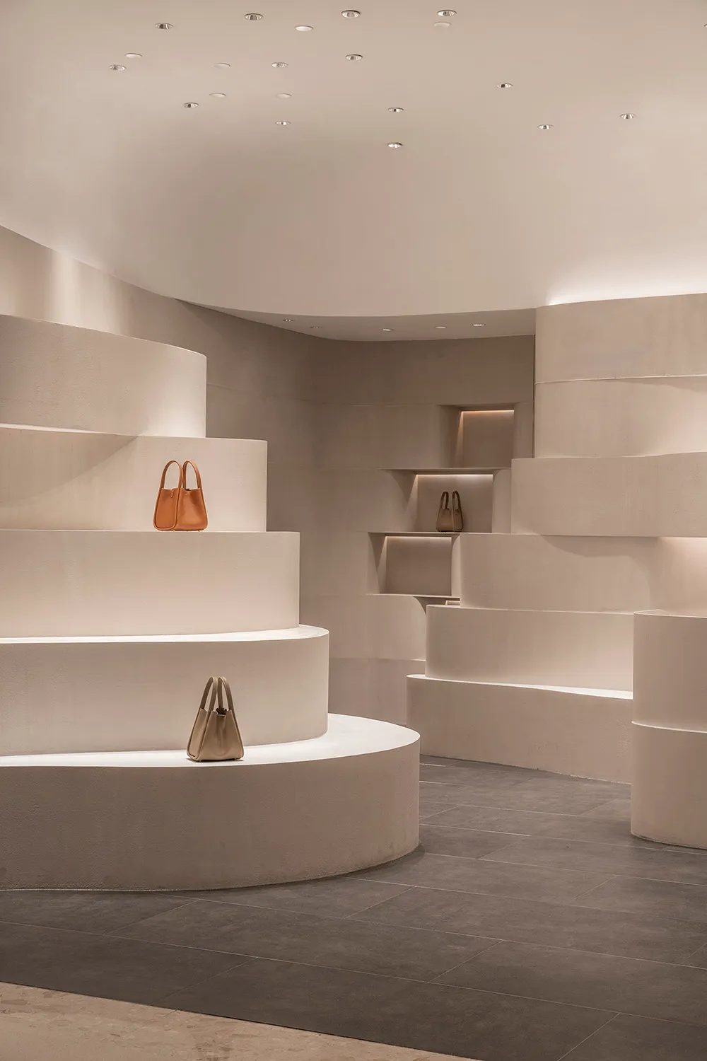 A minimalist space featuring concrete elements, designed for contemporary aesthetics.
