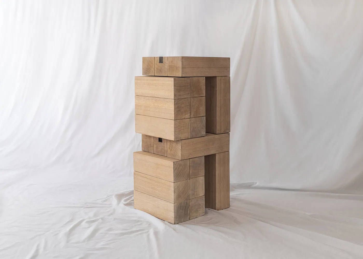 A modern wooden stool with a marble top.