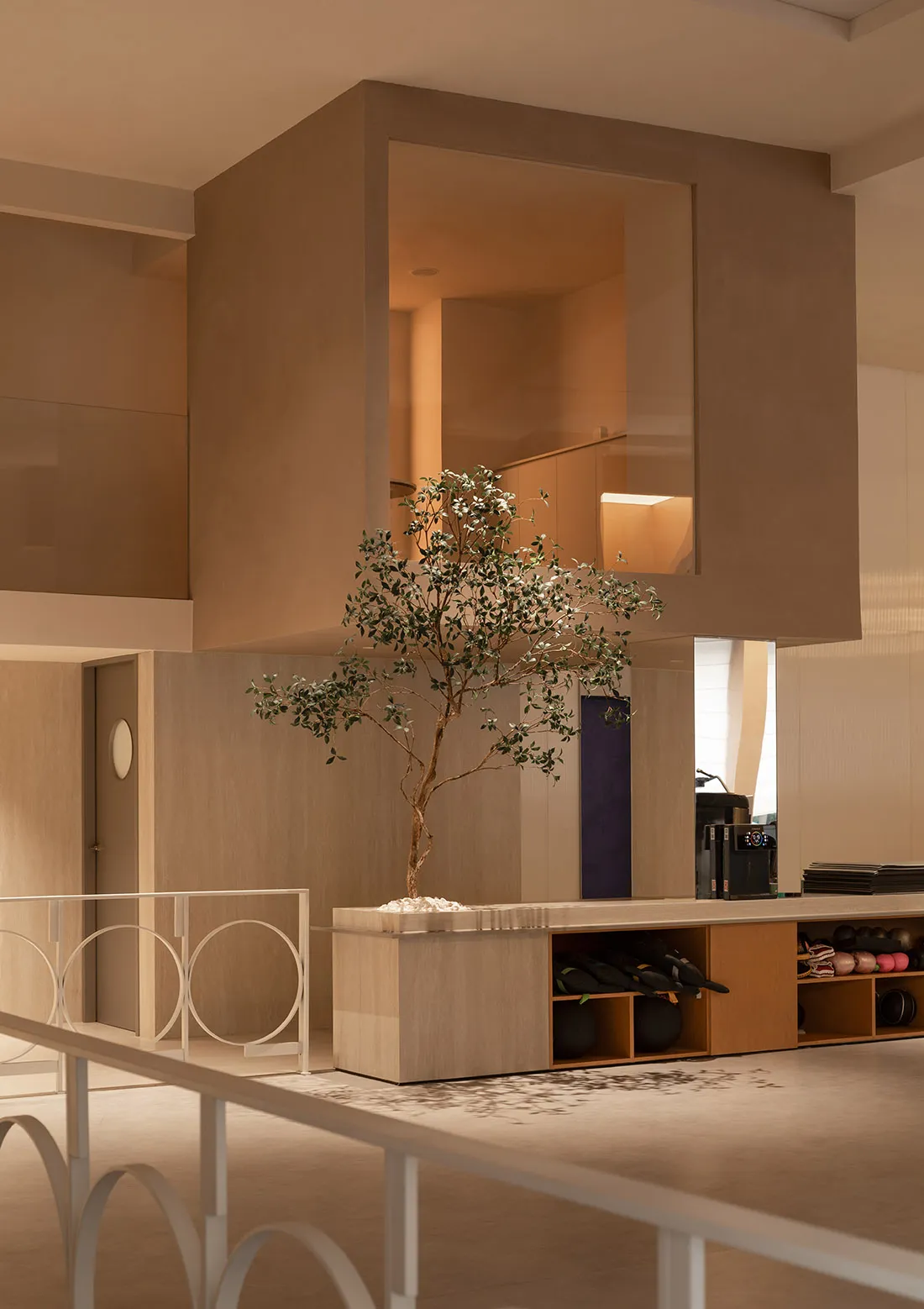 Minimalist interior design featuring wooden and concrete structures with a glass element.