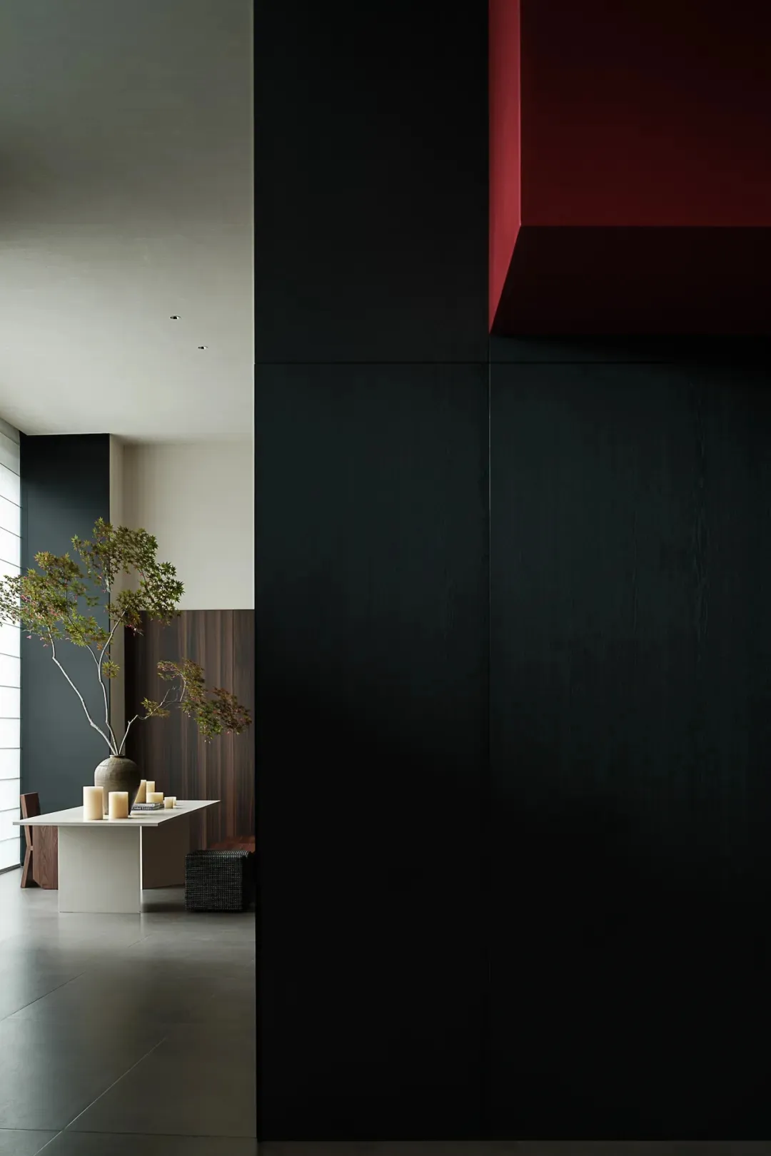Modern living space with black and red accents