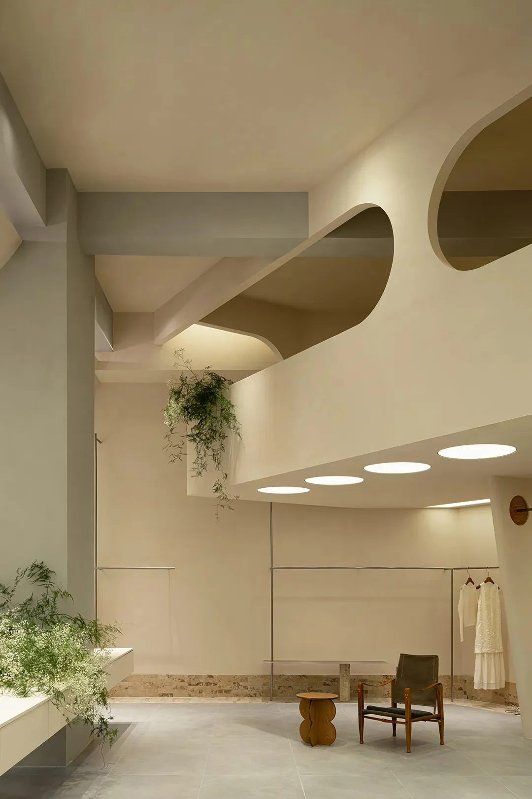Modern retail storefront featuring concrete structural elements