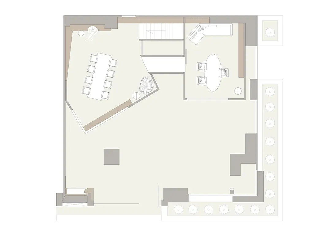 A floor plan of an office layout with desks, chairs, and conference areas.