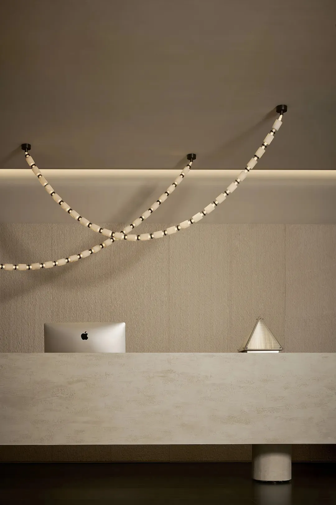 Modern, minimalist industrial-style reception desk made of metal