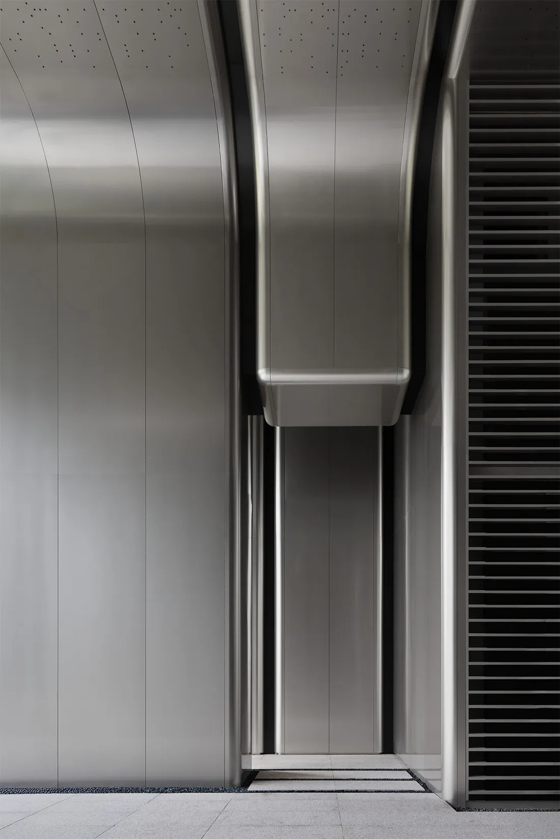 Modern design featuring metallic panels in an interior space