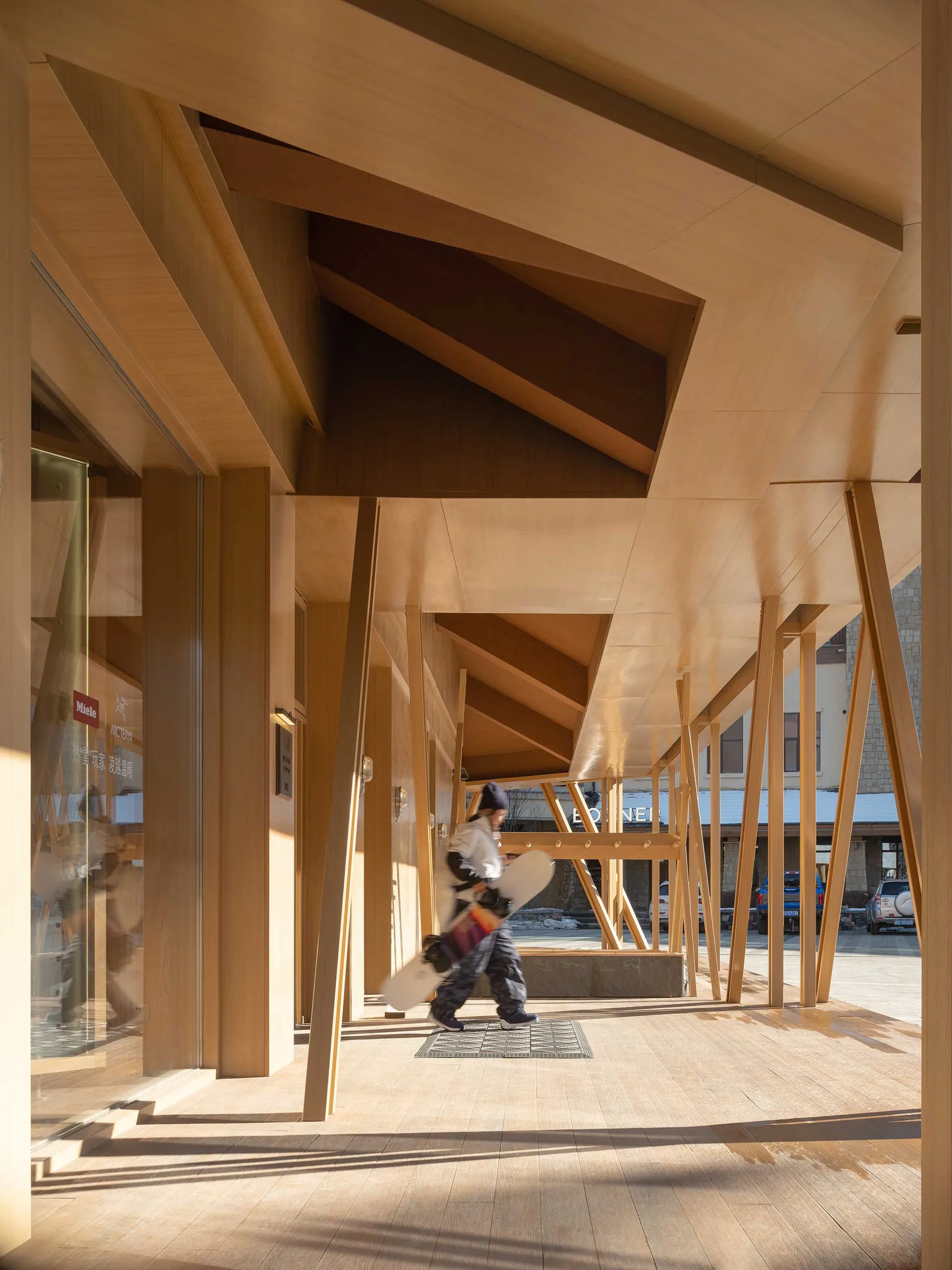 Industrial-style public space with wooden architecture and interior design elements.