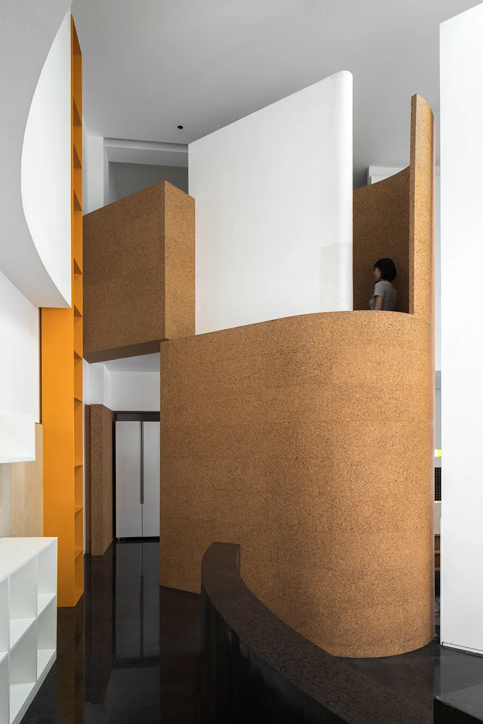 A modern interior design space featuring cork elements.