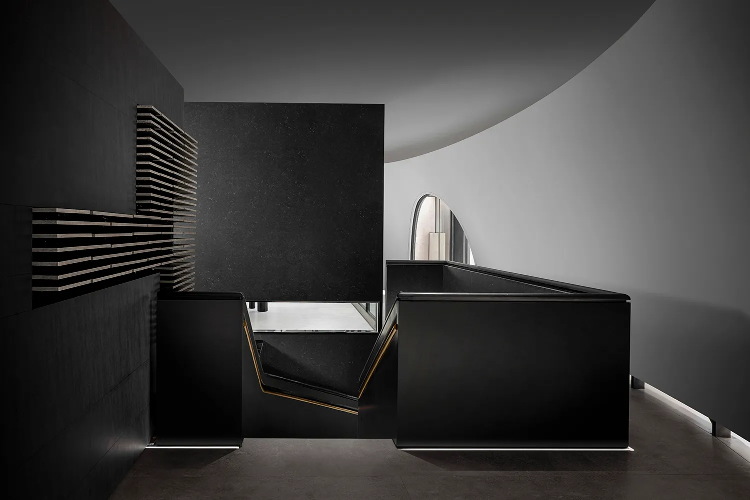 Modern black metal lounge area with sleek design and industrial aesthetic