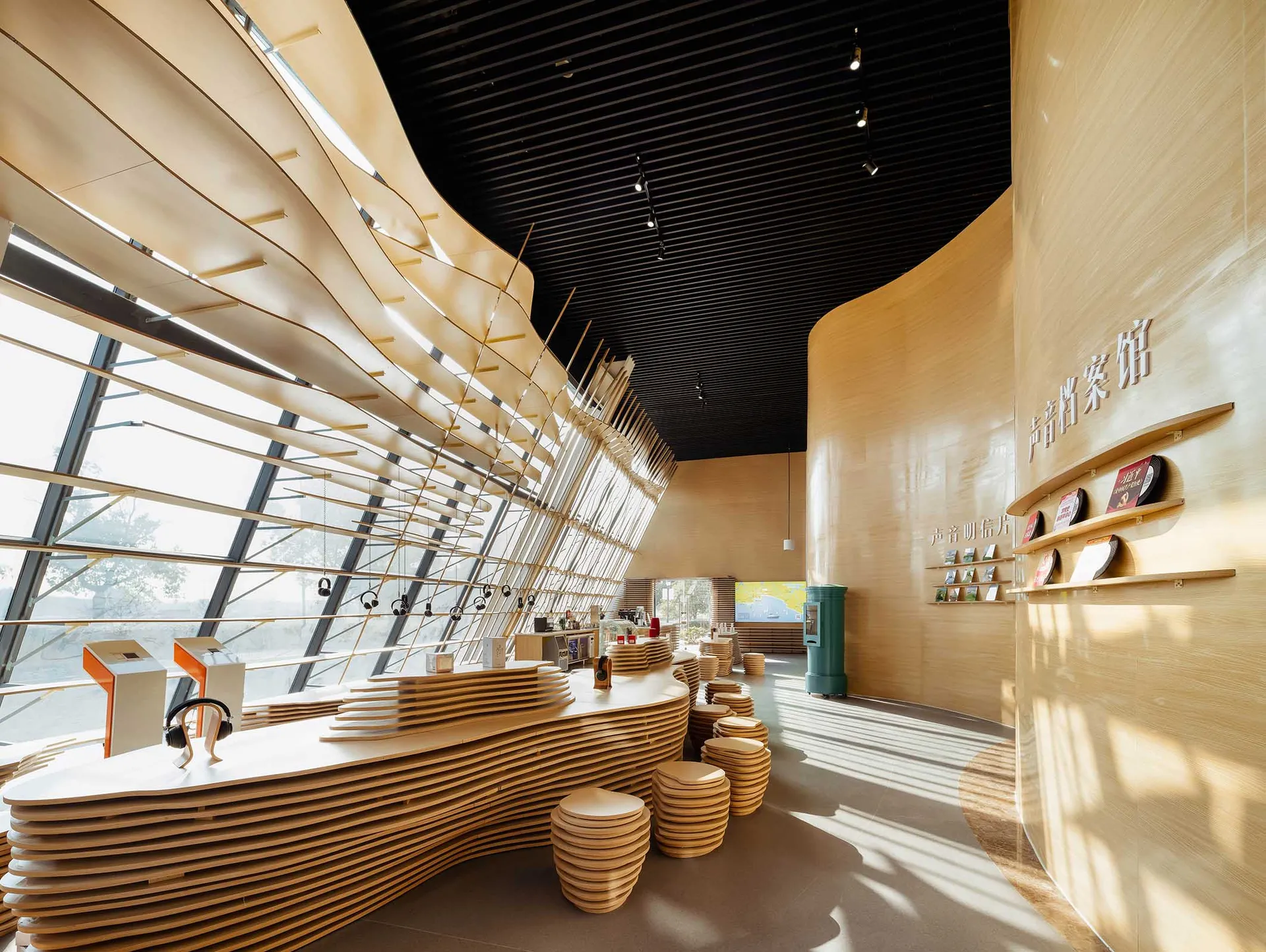 Contemporary cafe interior with wooden seating and tables